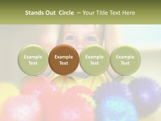 A Young Boy Is Holding His Head Above A Pile Of Balls PowerPoint Template