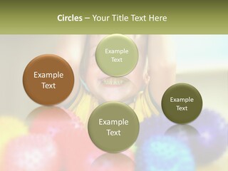 A Young Boy Is Holding His Head Above A Pile Of Balls PowerPoint Template