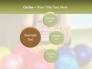 A Young Boy Is Holding His Head Above A Pile Of Balls PowerPoint Template