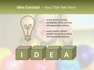 A Young Boy Is Holding His Head Above A Pile Of Balls PowerPoint Template