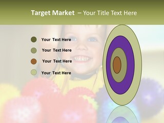 A Young Boy Is Holding His Head Above A Pile Of Balls PowerPoint Template