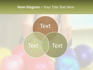 A Young Boy Is Holding His Head Above A Pile Of Balls PowerPoint Template