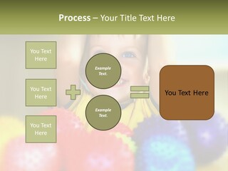 A Young Boy Is Holding His Head Above A Pile Of Balls PowerPoint Template