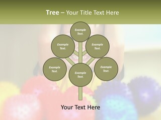 A Young Boy Is Holding His Head Above A Pile Of Balls PowerPoint Template