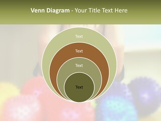 A Young Boy Is Holding His Head Above A Pile Of Balls PowerPoint Template