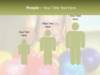 A Young Boy Is Holding His Head Above A Pile Of Balls PowerPoint Template