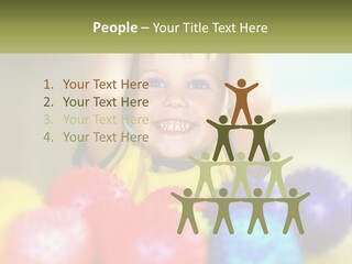 A Young Boy Is Holding His Head Above A Pile Of Balls PowerPoint Template