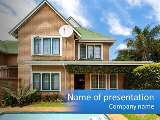 A House With A Swimming Pool In Front Of It PowerPoint Template