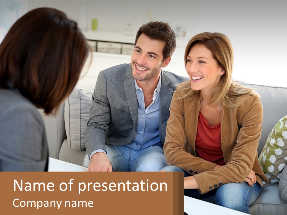A Man And Woman Sitting On A Couch Talking To Each Other PowerPoint Template