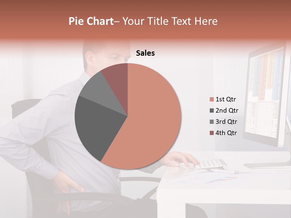 A Man Sitting At A Desk Using A Computer PowerPoint Template
