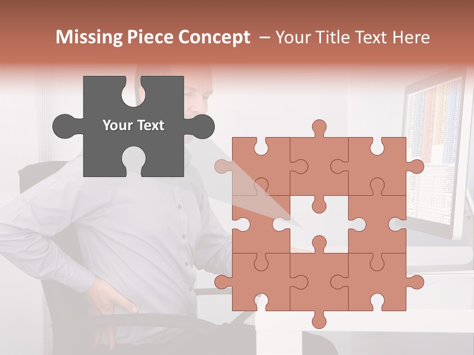 A Man Sitting At A Desk Using A Computer PowerPoint Template