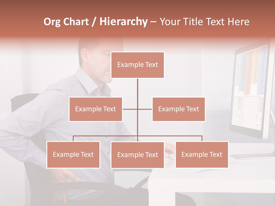 A Man Sitting At A Desk Using A Computer PowerPoint Template