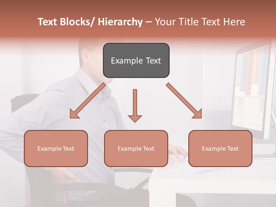 A Man Sitting At A Desk Using A Computer PowerPoint Template