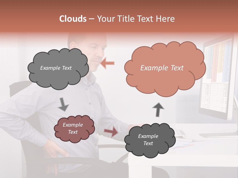 A Man Sitting At A Desk Using A Computer PowerPoint Template