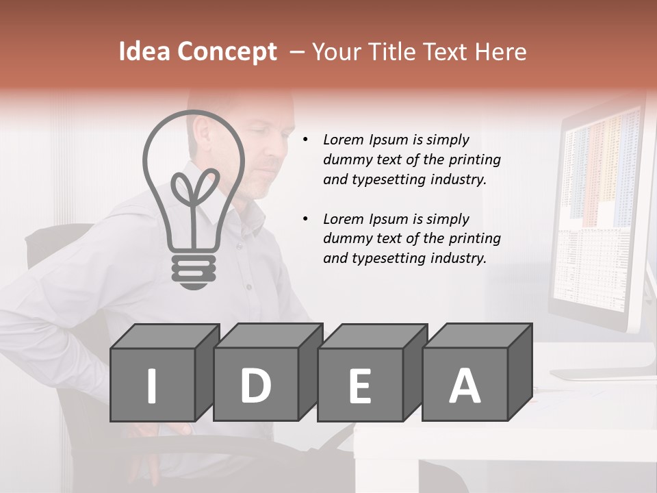A Man Sitting At A Desk Using A Computer PowerPoint Template