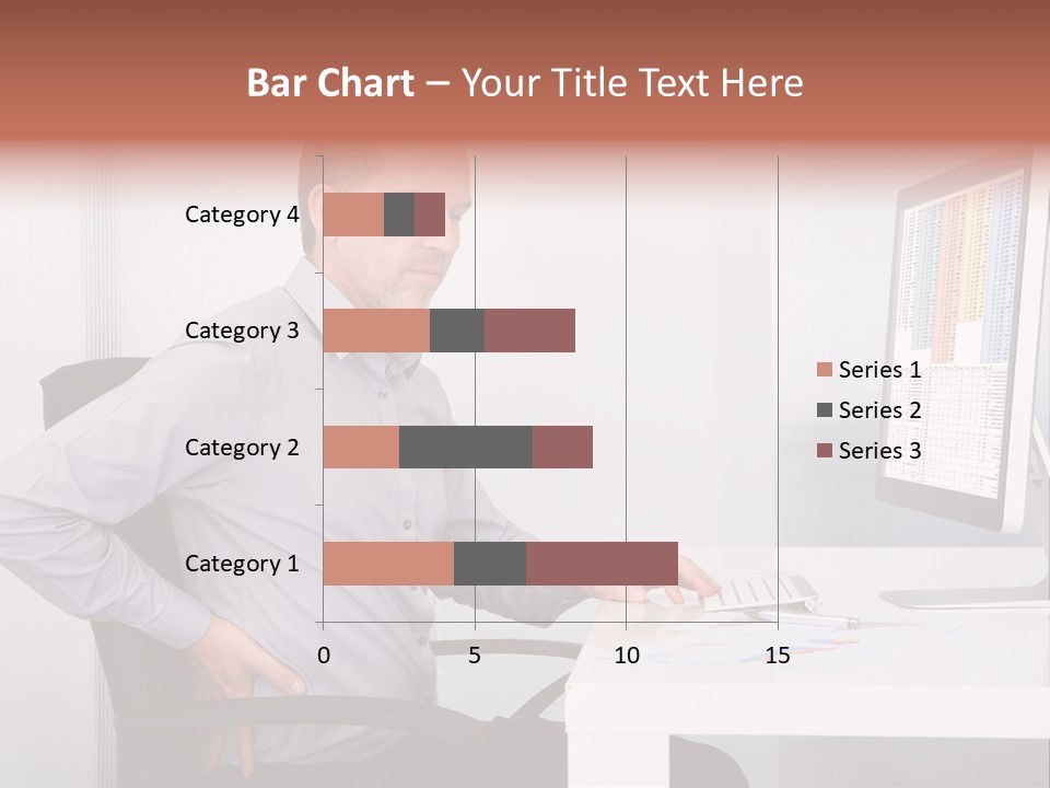 A Man Sitting At A Desk Using A Computer PowerPoint Template