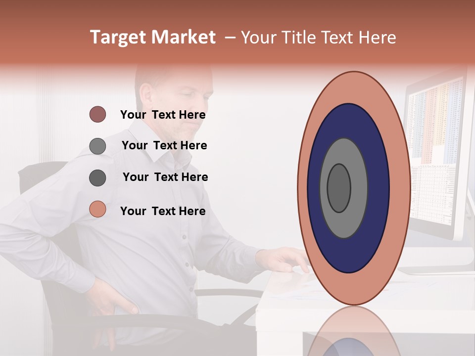 A Man Sitting At A Desk Using A Computer PowerPoint Template