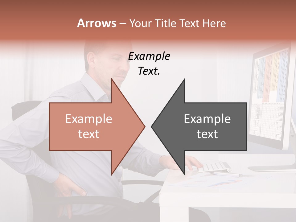 A Man Sitting At A Desk Using A Computer PowerPoint Template