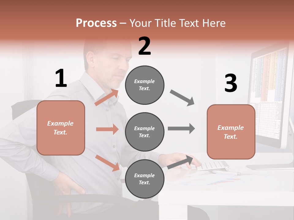 A Man Sitting At A Desk Using A Computer PowerPoint Template