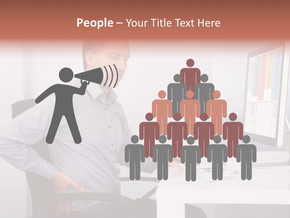 A Man Sitting At A Desk Using A Computer PowerPoint Template