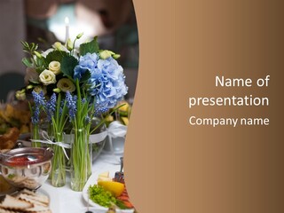 A Table Topped With A Vase Filled With Blue Flowers PowerPoint Template