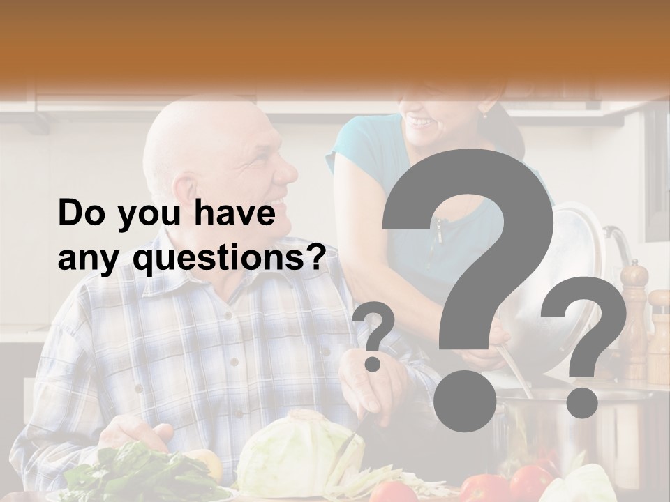 A Man And A Woman Cooking Together In The Kitchen PowerPoint Template