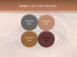 A Close Up Of An Eye With A Brown Background PowerPoint Template