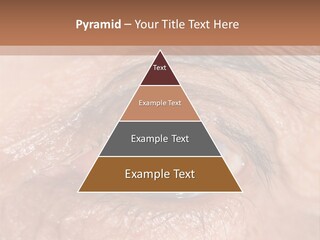 A Close Up Of An Eye With A Brown Background PowerPoint Template