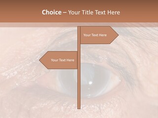 A Close Up Of An Eye With A Brown Background PowerPoint Template