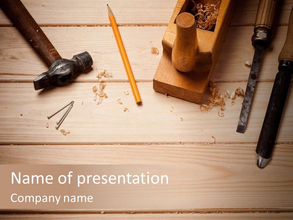 A Wooden Table Topped With Lots Of Tools PowerPoint Template