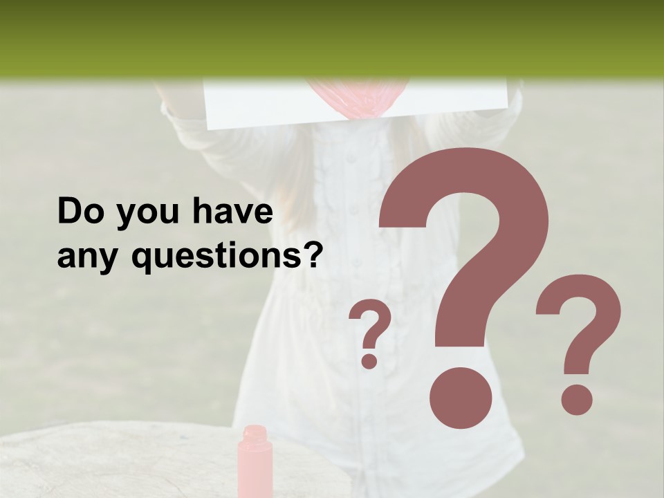 A Girl Holding A Piece Of Paper With A Heart Drawn On It PowerPoint Template