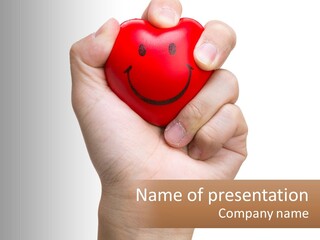 A Person Holding A Red Heart With A Smiley Face On It PowerPoint Template
