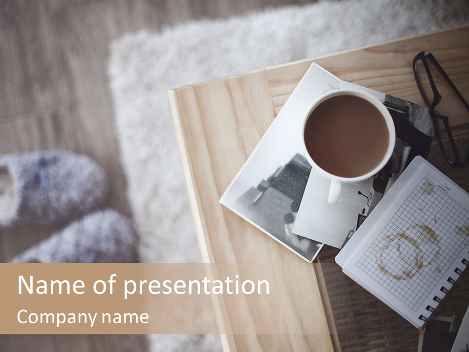 A Cup Of Coffee Sitting On Top Of A Wooden Table PowerPoint Template