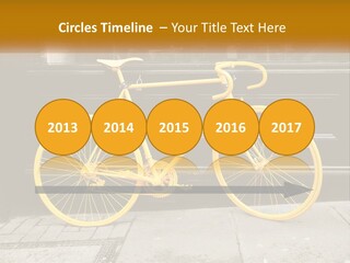 A Yellow Bicycle Parked On The Side Of A Building PowerPoint Template