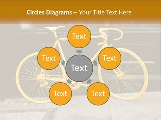 A Yellow Bicycle Parked On The Side Of A Building PowerPoint Template