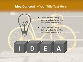 A Yellow Bicycle Parked On The Side Of A Building PowerPoint Template
