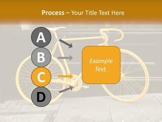 A Yellow Bicycle Parked On The Side Of A Building PowerPoint Template