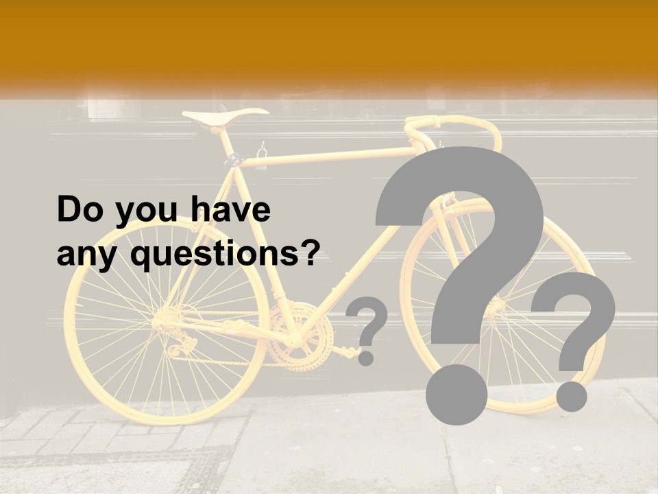 A Yellow Bicycle Parked On The Side Of A Building PowerPoint Template