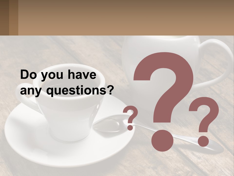 A Cup Of Coffee And A Spoon On A Wooden Table PowerPoint Template