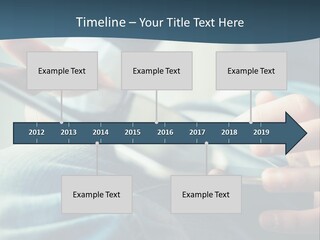 A Person Holding A Cell Phone In Their Hands PowerPoint Template