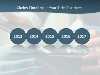 A Person Holding A Cell Phone In Their Hands PowerPoint Template