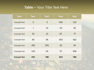 An Hourglass Sitting On Top Of A Pile Of Rocks PowerPoint Template