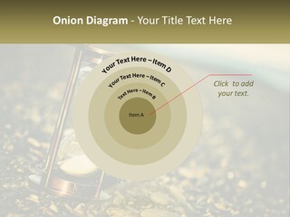 An Hourglass Sitting On Top Of A Pile Of Rocks PowerPoint Template