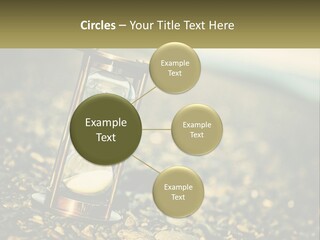 An Hourglass Sitting On Top Of A Pile Of Rocks PowerPoint Template