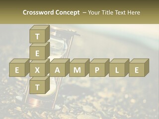 An Hourglass Sitting On Top Of A Pile Of Rocks PowerPoint Template