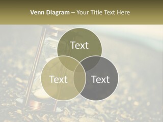 An Hourglass Sitting On Top Of A Pile Of Rocks PowerPoint Template