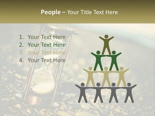 An Hourglass Sitting On Top Of A Pile Of Rocks PowerPoint Template