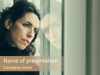 A Woman Looking Out Of A Window With A Curtain PowerPoint Template