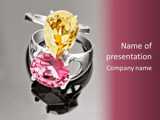 A Ring With A Yellow And Pink Stone On It PowerPoint Template