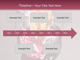 A Ring With A Yellow And Pink Stone On It PowerPoint Template